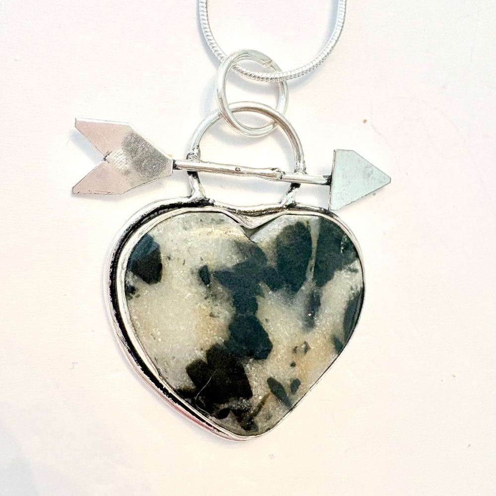1 1/2 in. Hornblende heart shaped pendant, with arrow, on a silver chain